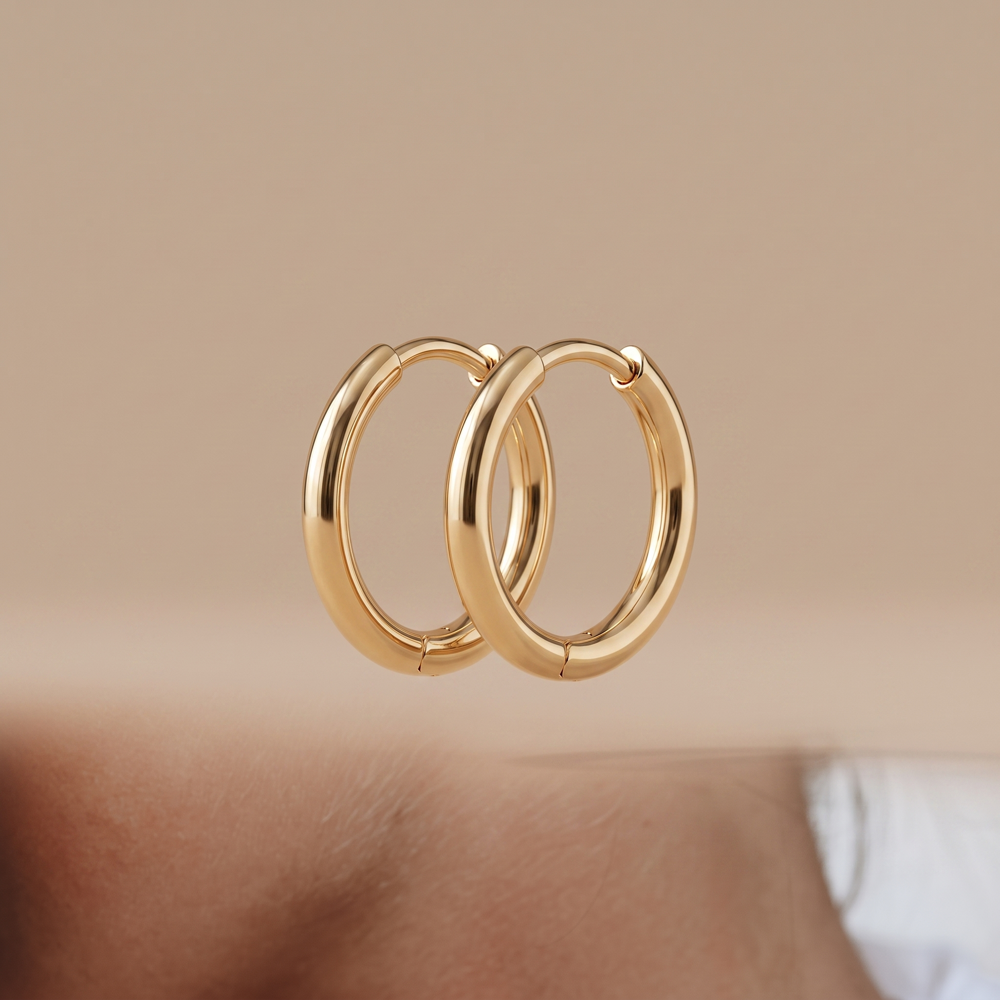 Asea Mini Huggie Earrings — 14K Gold Color