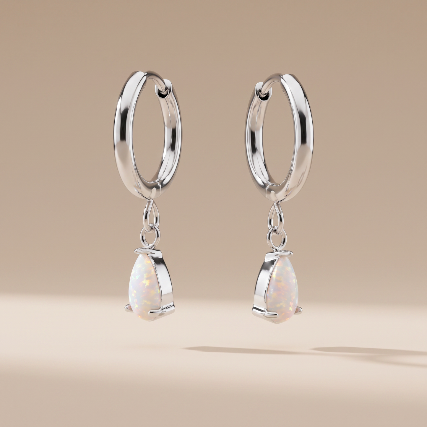 Asea Opal Teardrop Hoops — Silver color