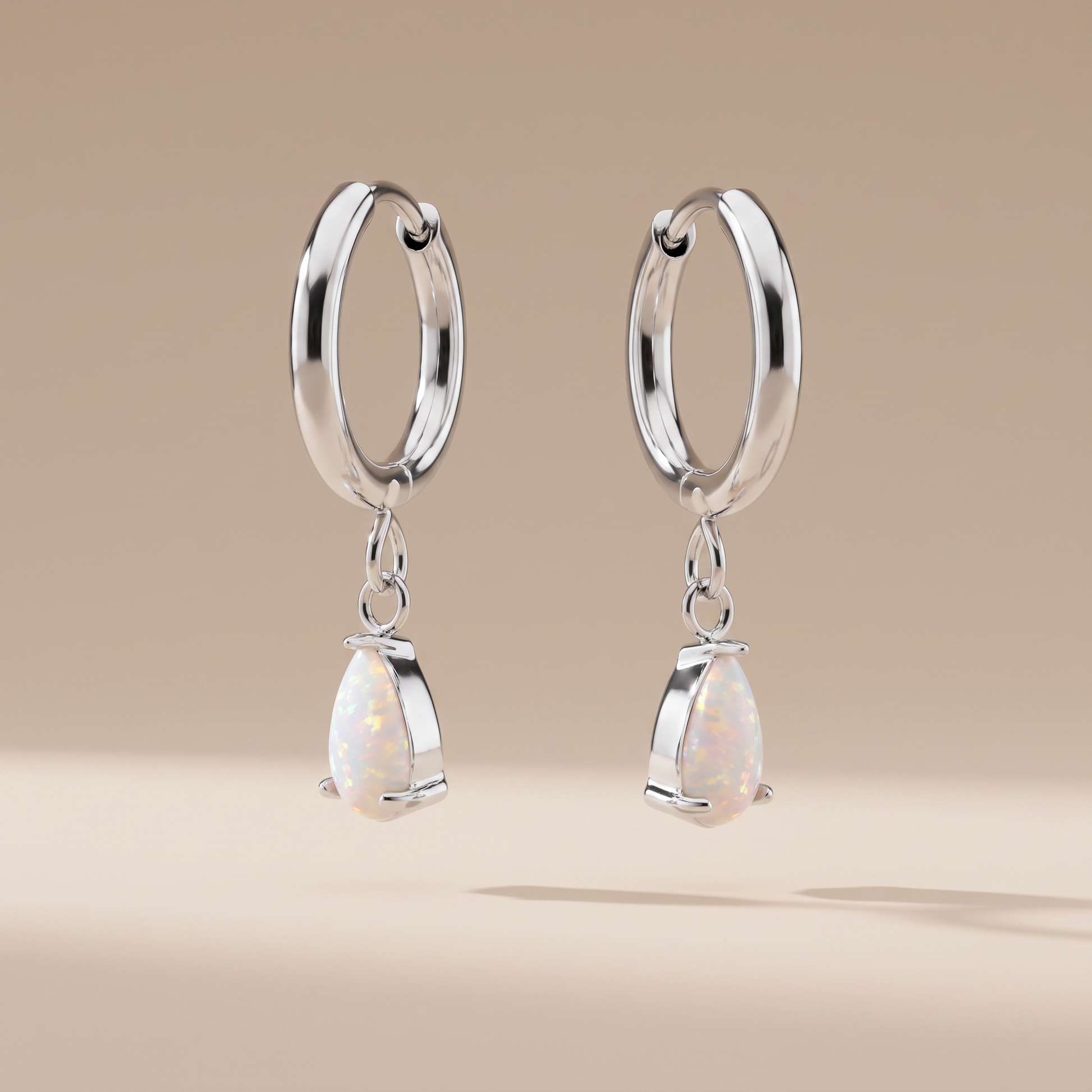 Asea Opal Teardrop Hoops — Silver color