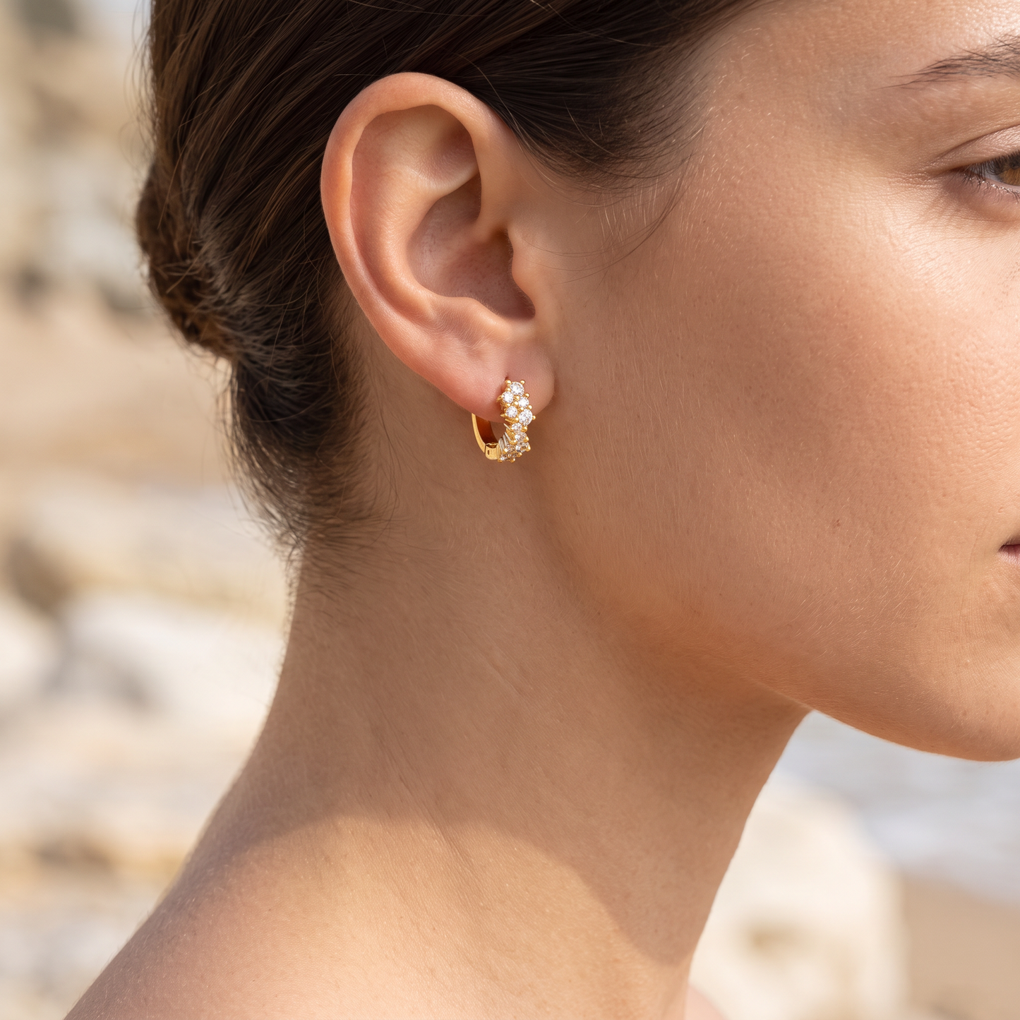 Asea Lumina Huggie Hoops — worn by model