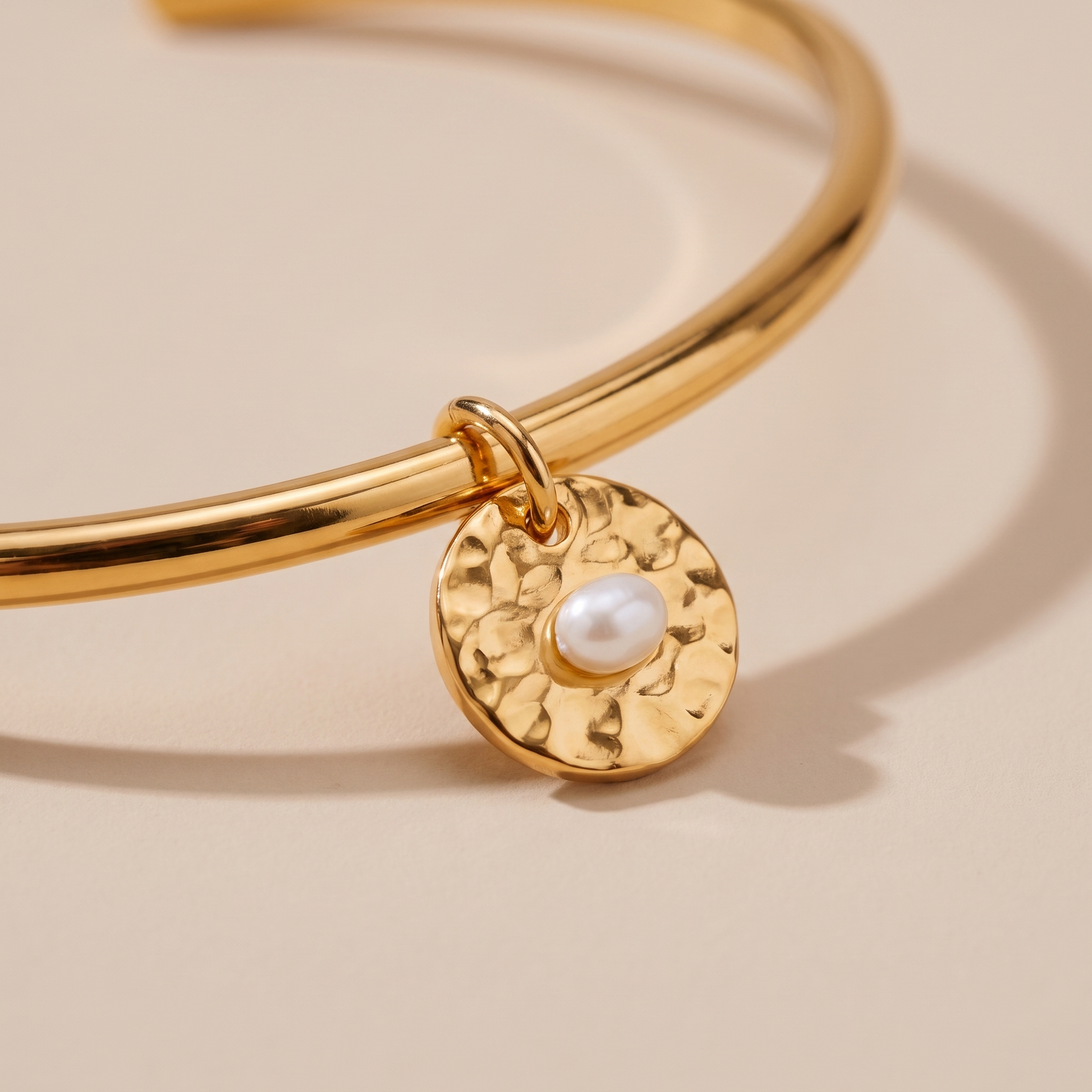 Asea Islet Hammered Pearl Bangle — close-up detail