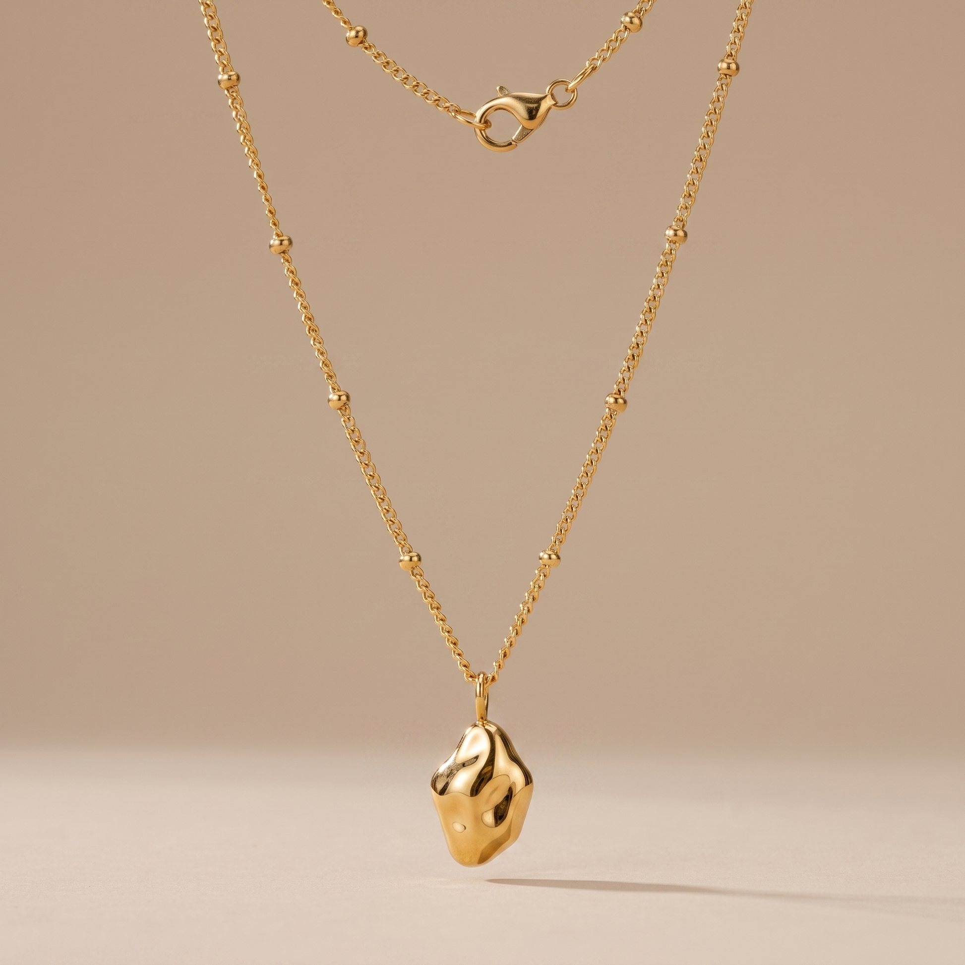 Asea Gilded Nugget Necklace — front view