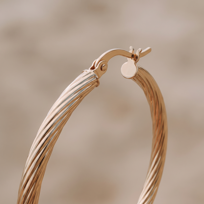Asea Twisted Statement Hoops — close-up detail