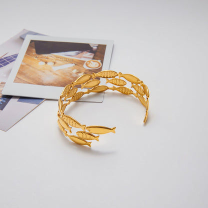 Tidewater Openwork Fish Bangle Bracelet