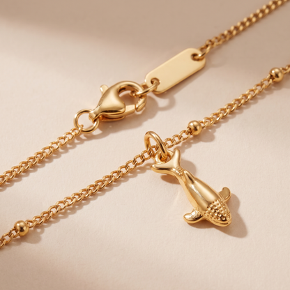 Asea Whale Charm Necklace — close-up detail