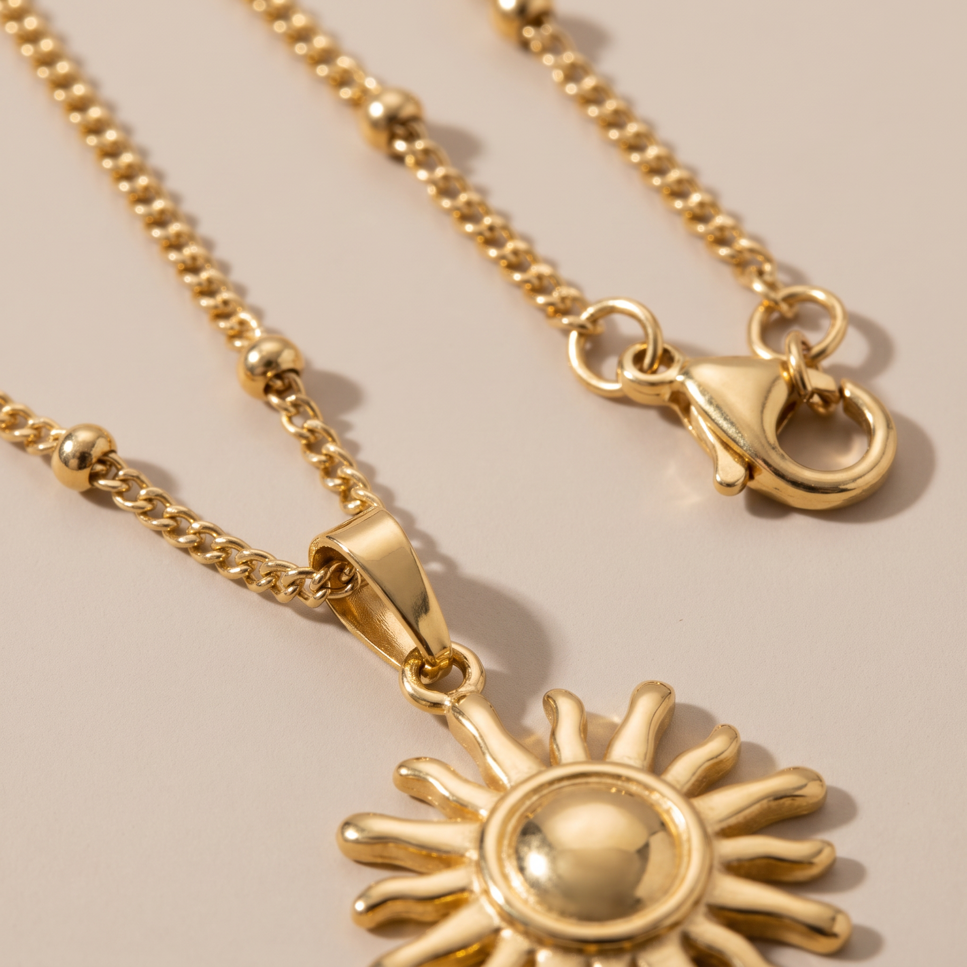 Asea Sun Charm Necklace — close-up detail