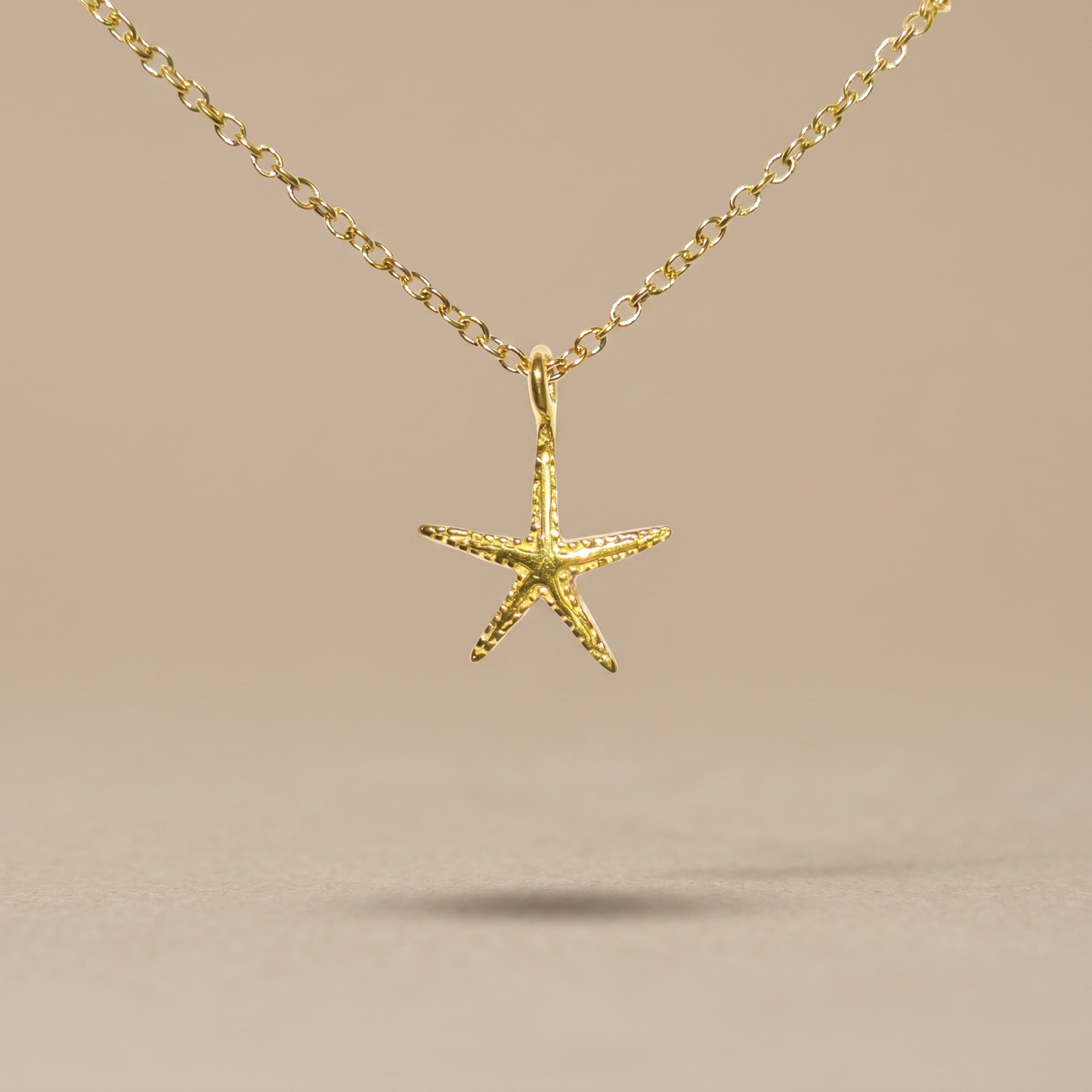 Asea Starfish Charm Necklace — front view