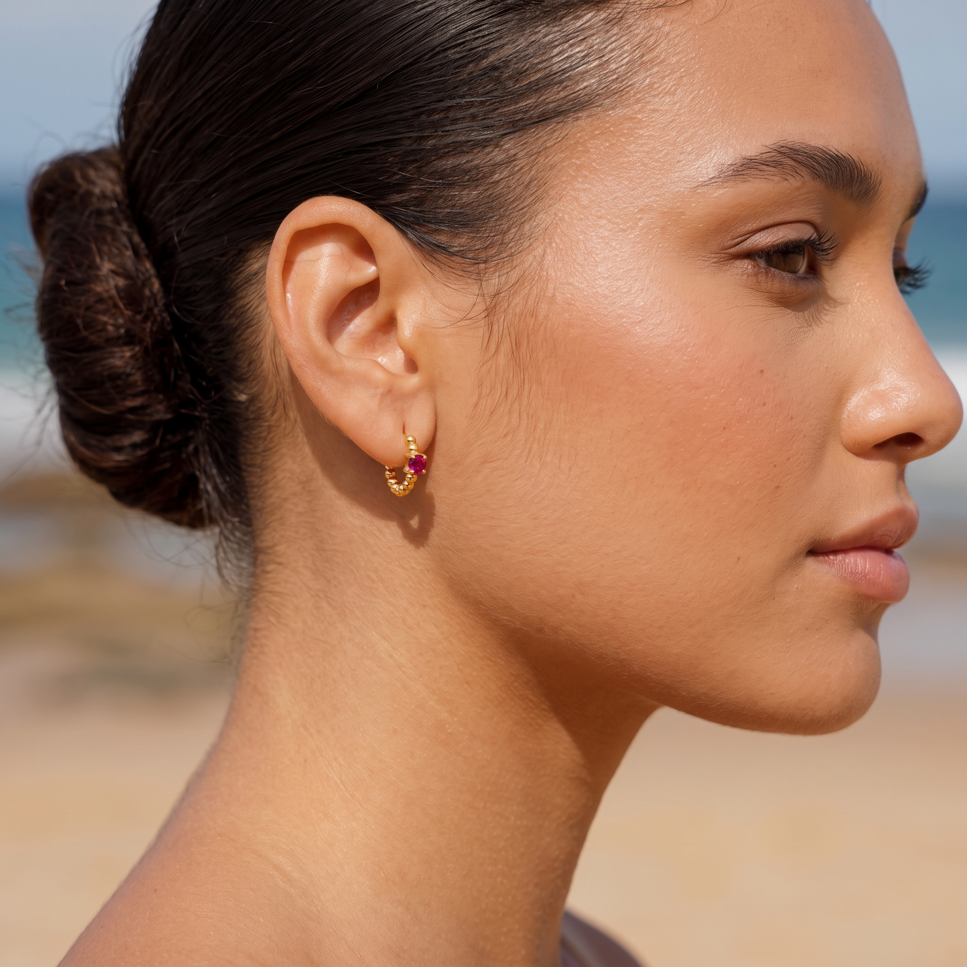 Asea Rosella Huggie Hoops — worn by model