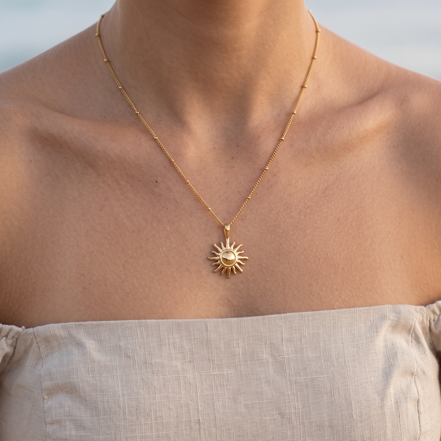 Asea Sun Charm Necklace — worn by model