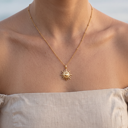 Asea Sun Charm Necklace — worn by model