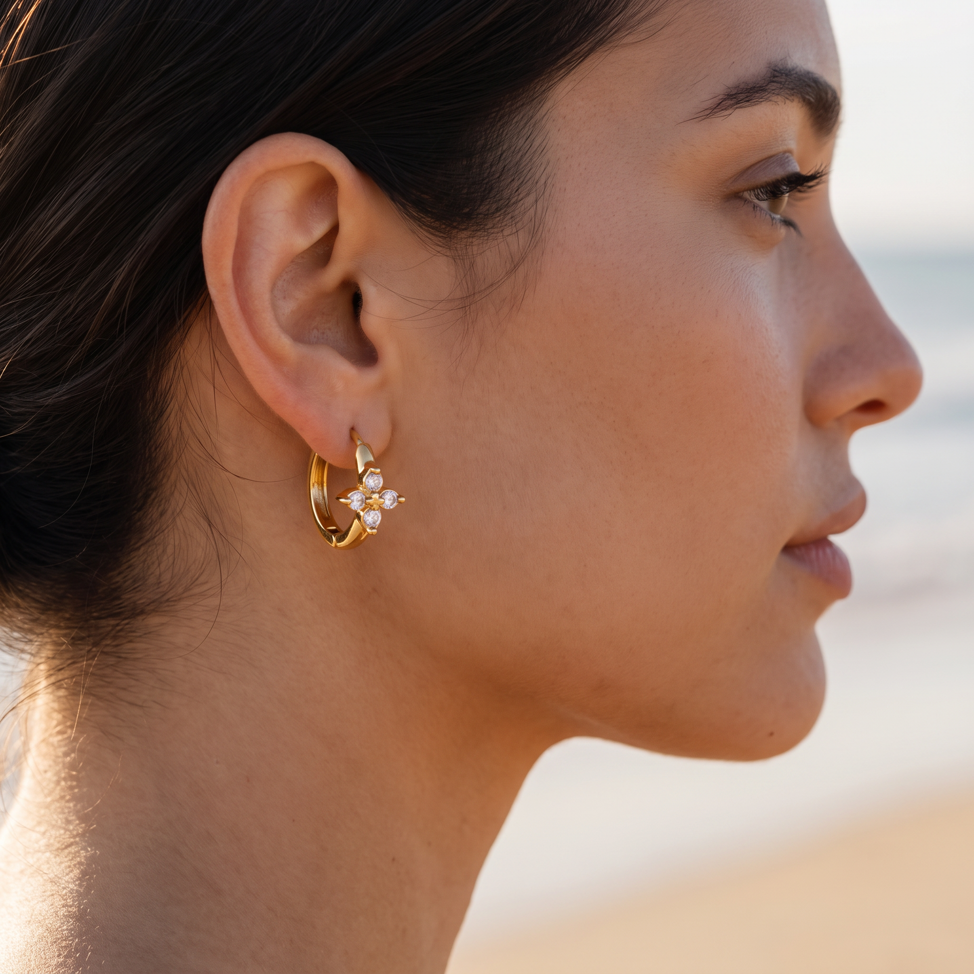 Asea Daisy Huggie Hoops — worn by model