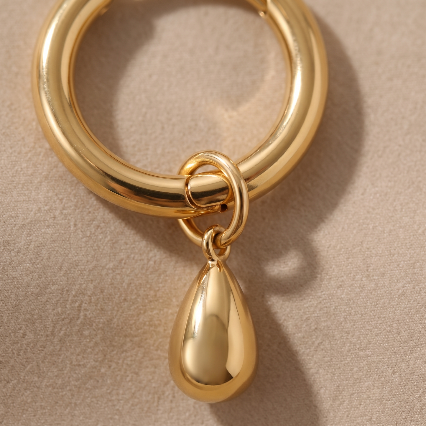 Asea Sculpted Drop Hoop Earrings — close-up detail