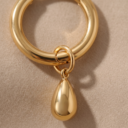 Asea Sculpted Drop Hoop Earrings — close-up detail