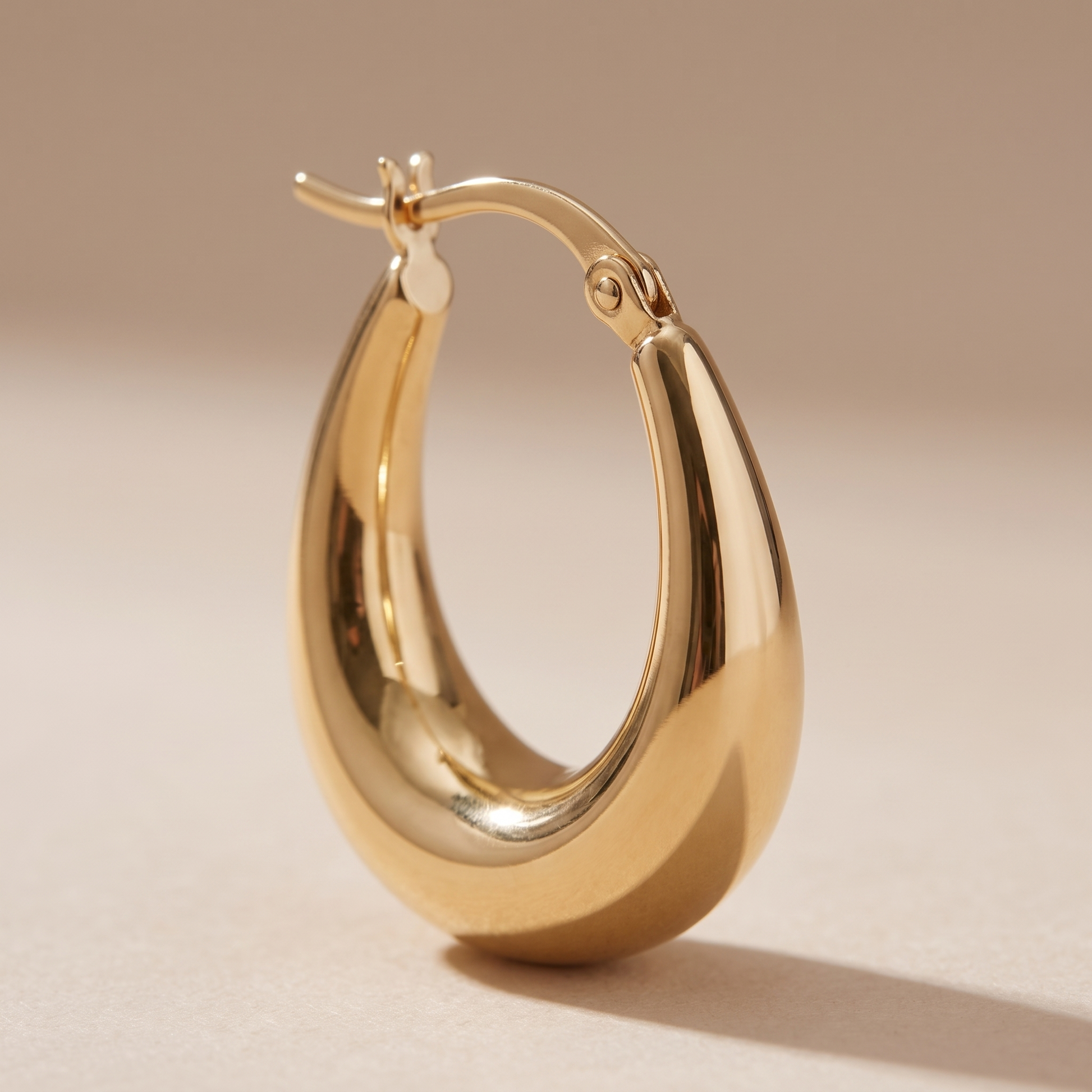Asea Golden Drop Earrings — close-up detail
