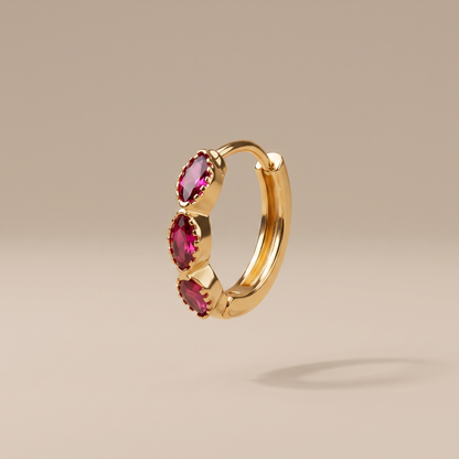 Asea Garnet Huggie Hoops — front view