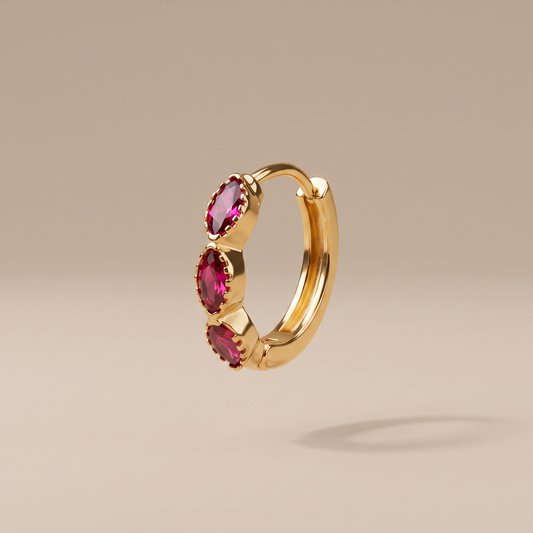 Asea Garnet Huggie Hoops — front view