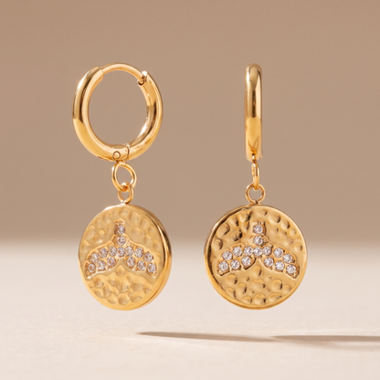 Asea Whale Tail Huggie Earrings — front view