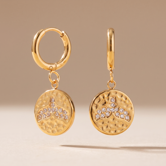 Asea Whale Tail Huggie Earrings — front view