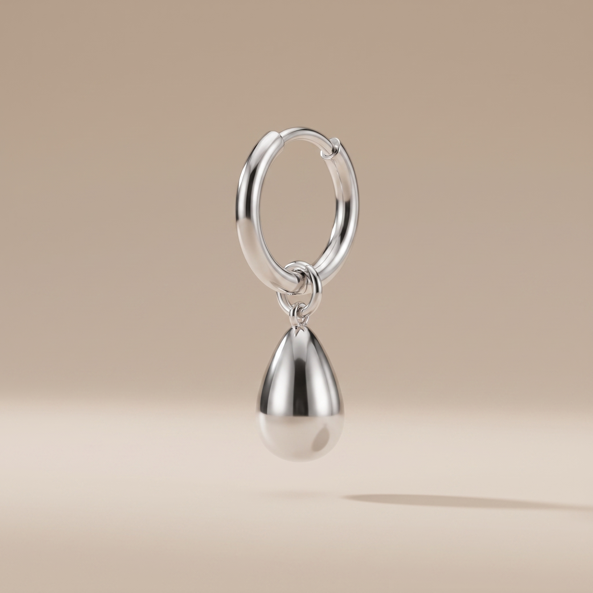 Asea Sculpted Drop Hoop Earrings — Silver color