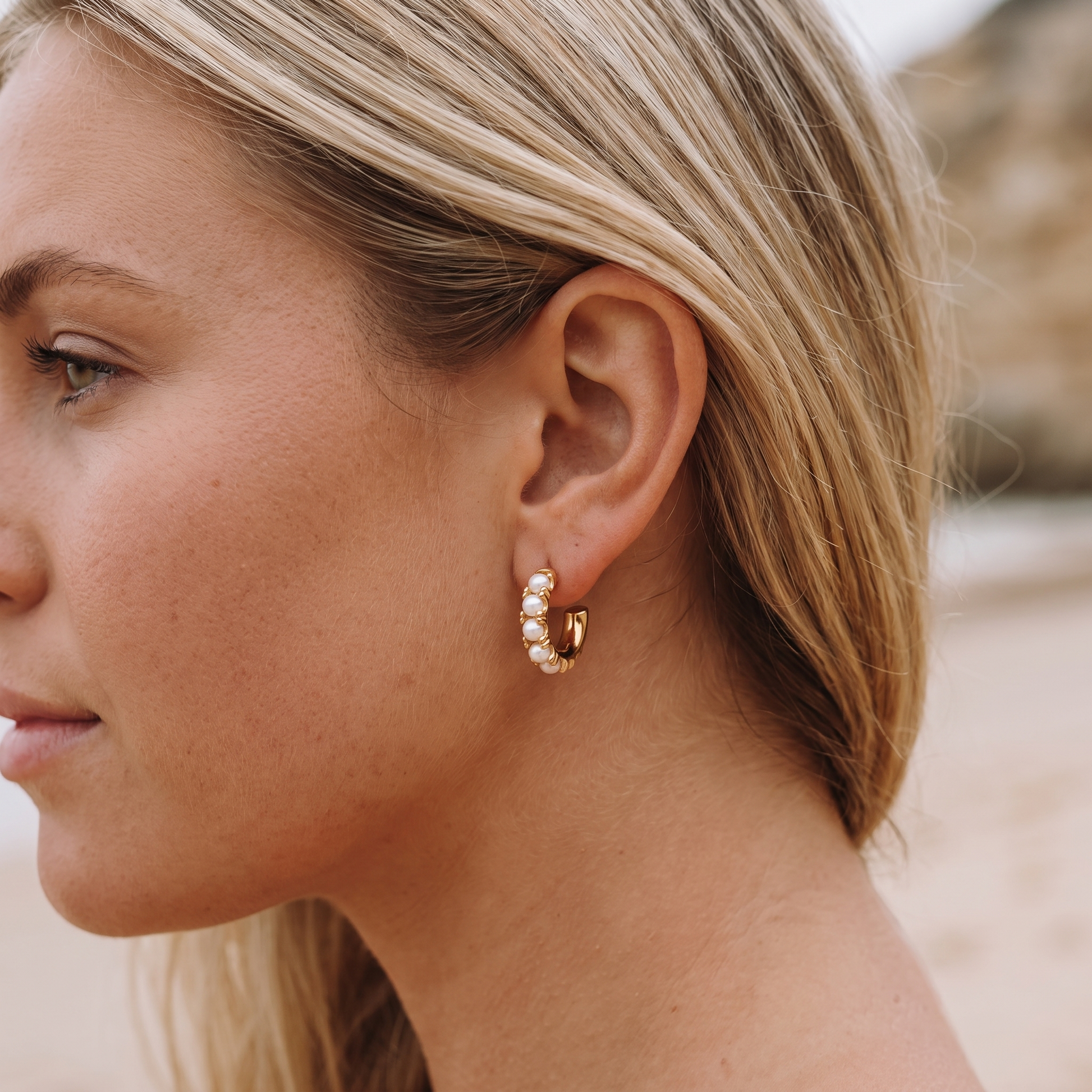 Asea Petite Pearl Huggie Hoops — worn by model