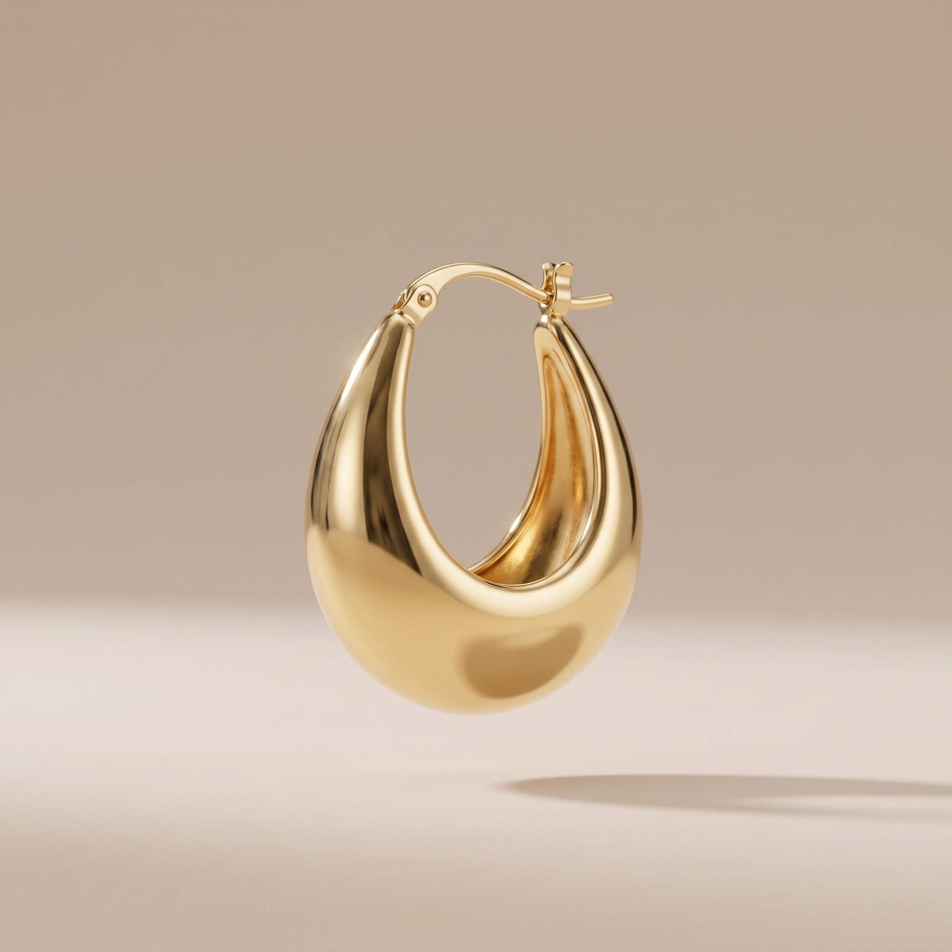 Asea Golden Drop Earrings — front view
