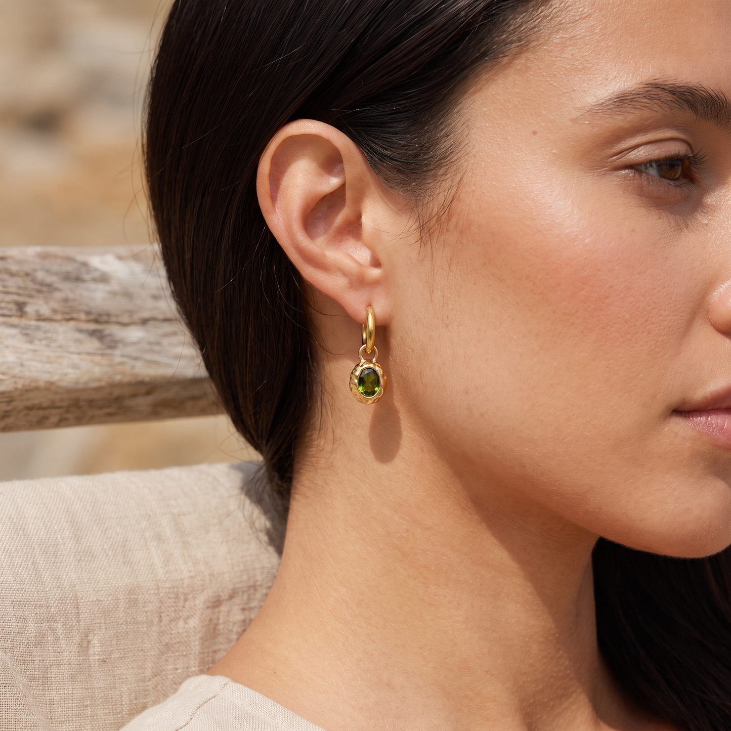 Asea Olive Drop Huggie Earrings — worn by model