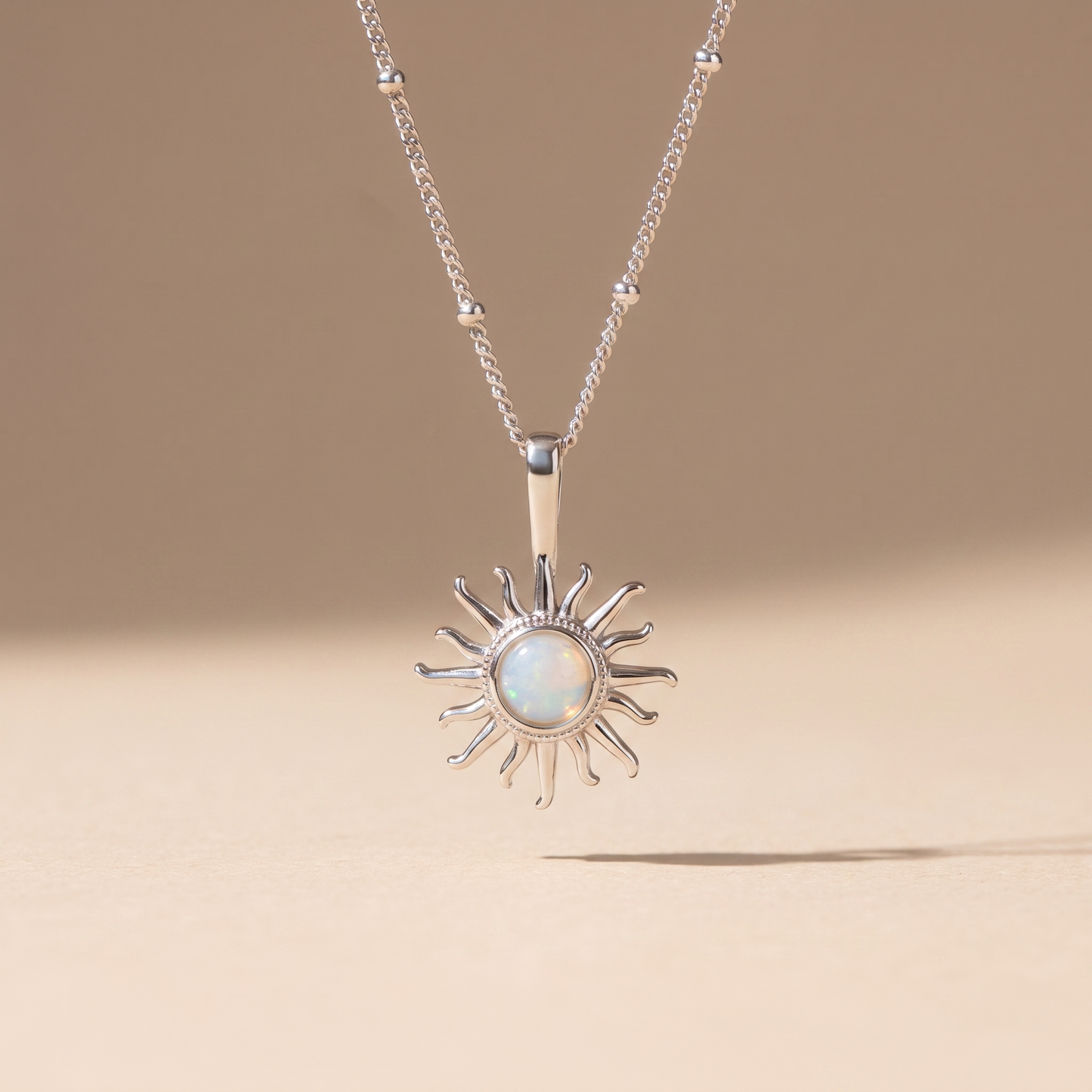 Asea Sun Charm Necklace — Silver color
