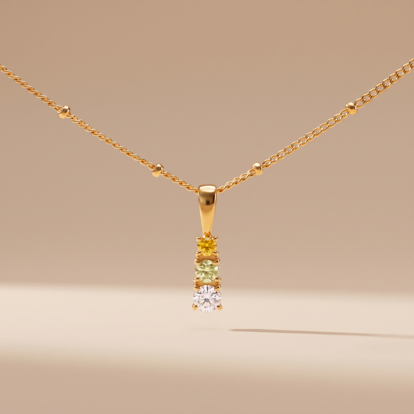 Asea Citrus Charm Necklace — front view