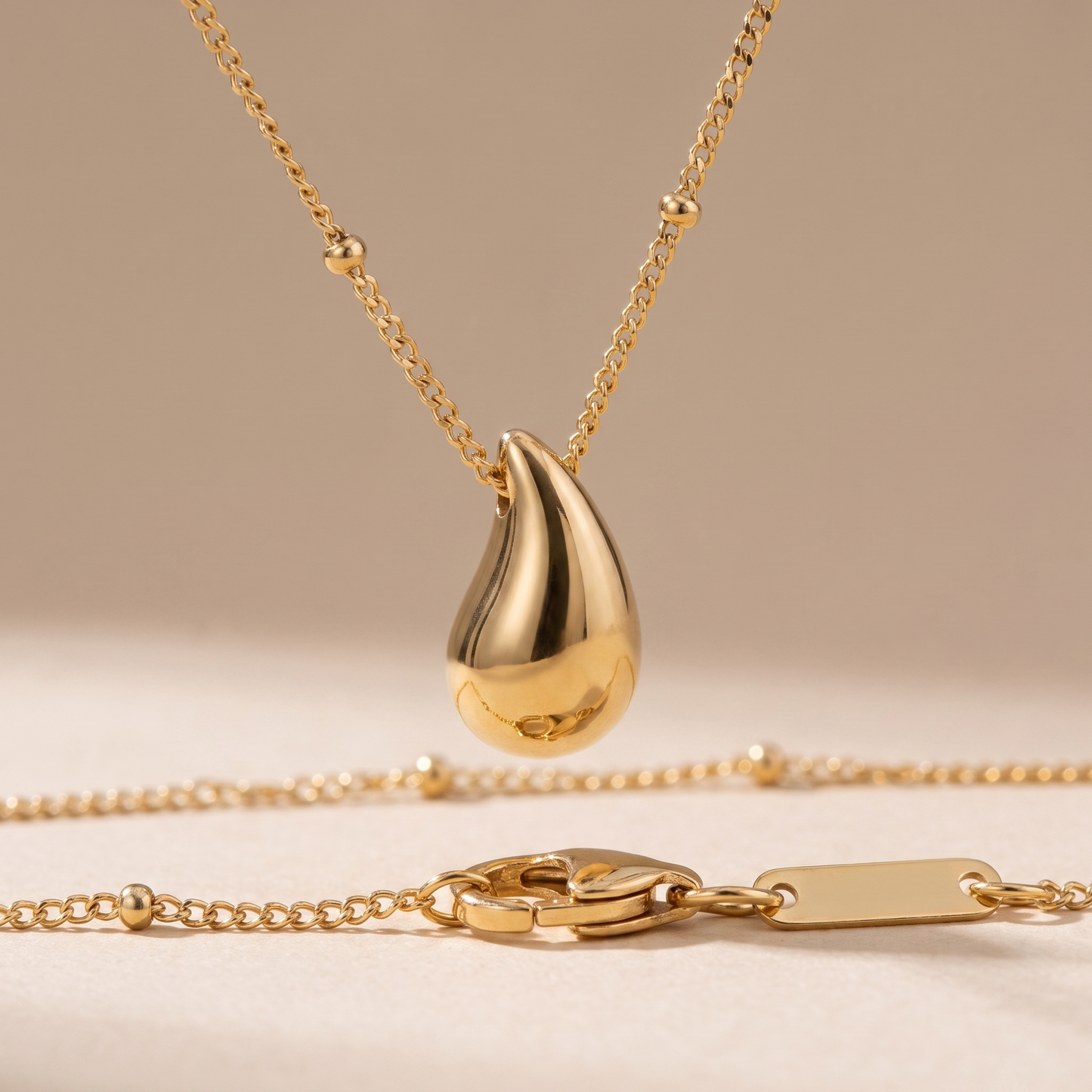 Asea Golden Drop Pendant Necklace — close-up detail