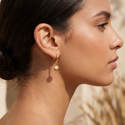 Asea North Star Charm Hoops — worn by model