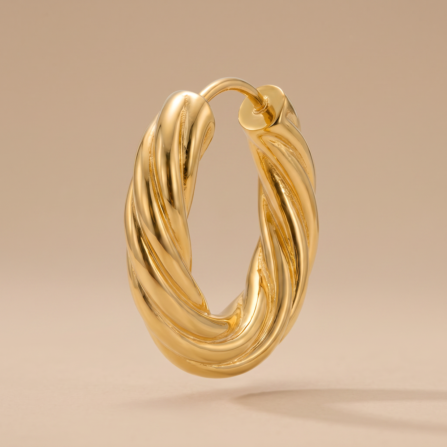 Asea Twisted Hoop Earrings — front view