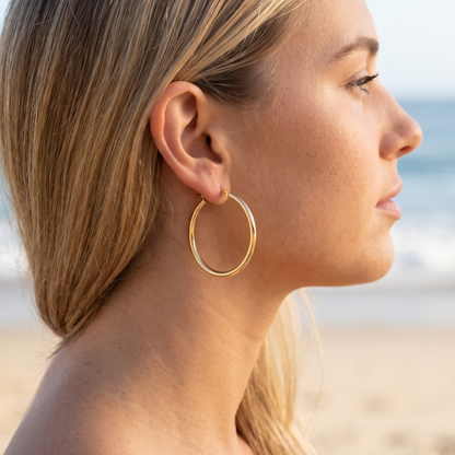 Asea Slim Gold Hoops — worn by model