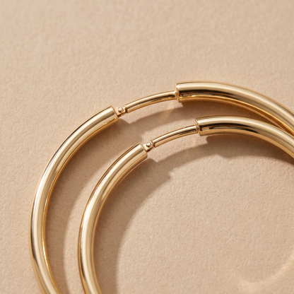 Asea Slim Gold Hoops — close-up detail