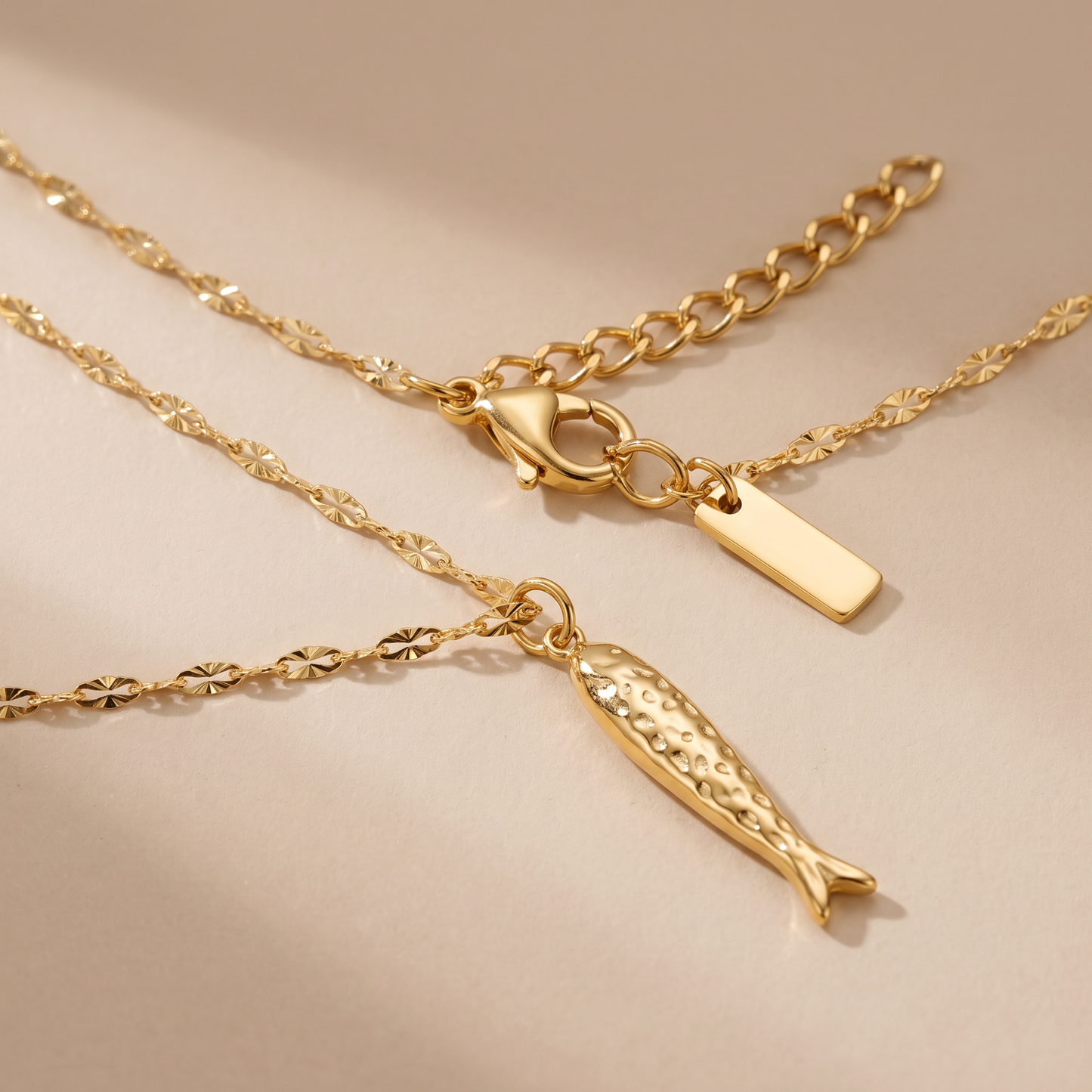 Asea Lucky Fish Charm Necklace — close-up detail