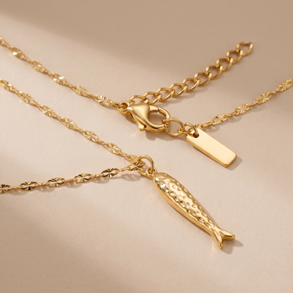 Asea Lucky Fish Charm Necklace — close-up detail