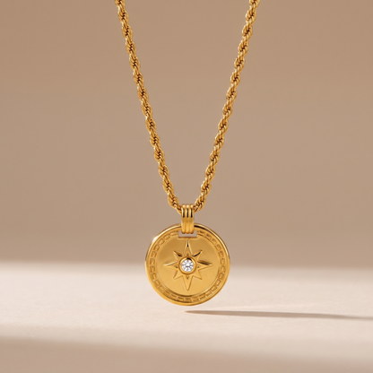 Asea Gold Compass Pendant Necklace — front view