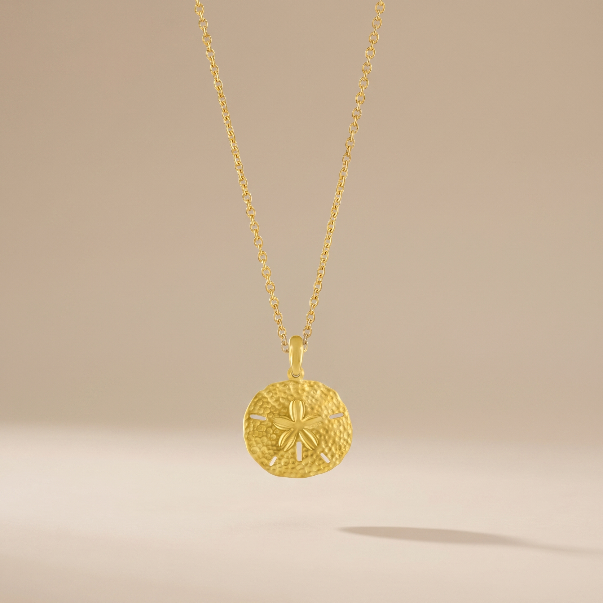 Asea Sand Dollar Pendant Necklace — front view