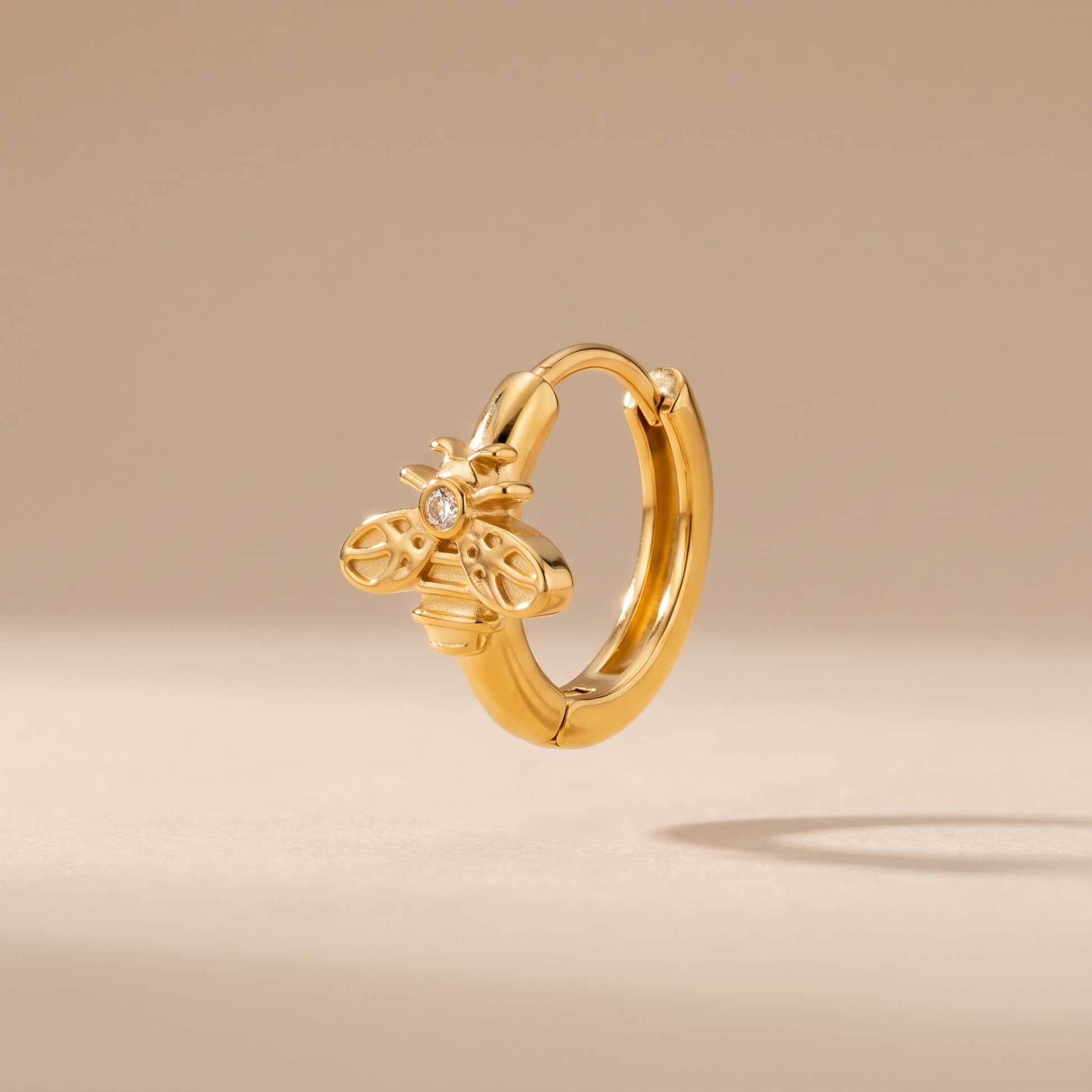 Asea Honeybee Huggie Earrings — front view