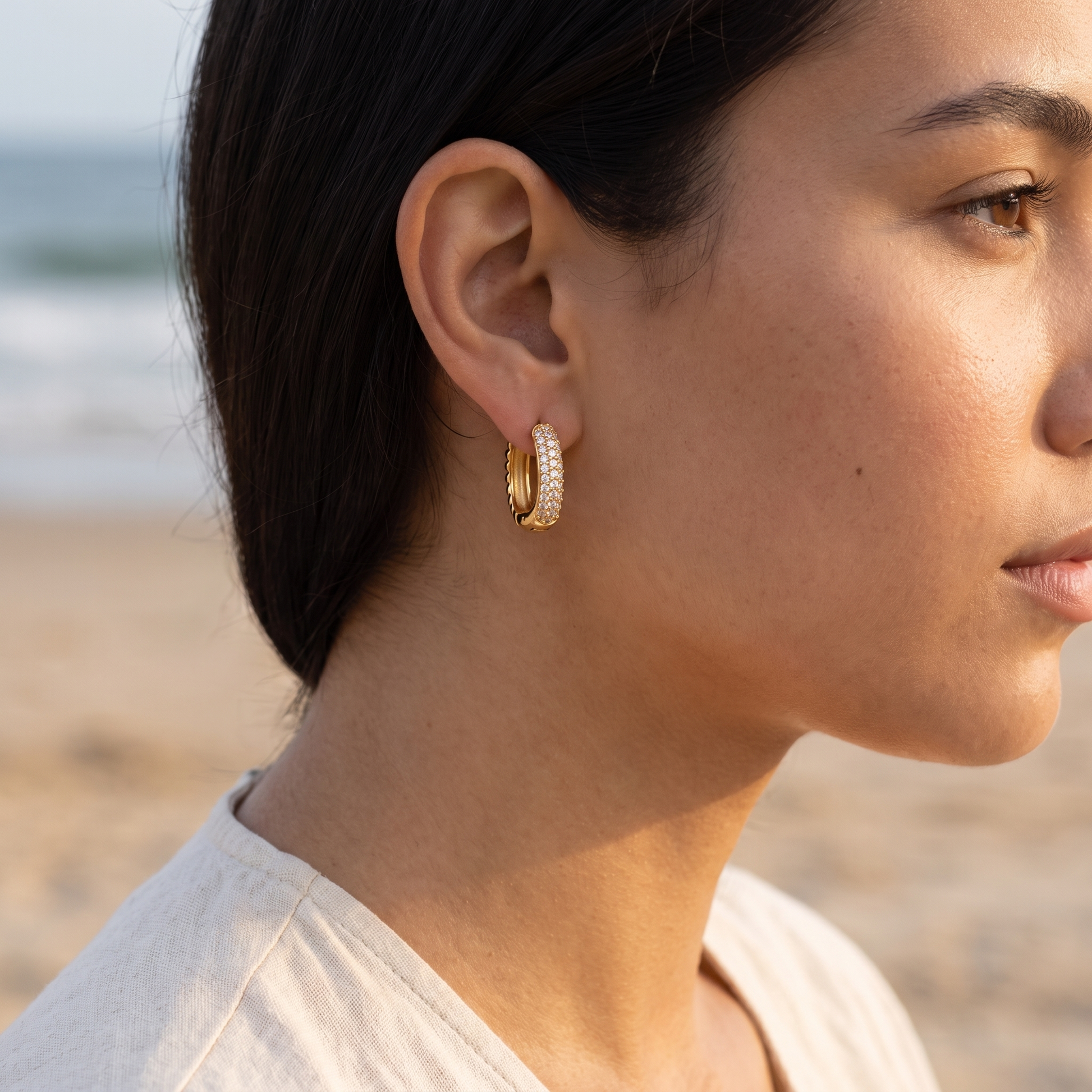 Asea Nevada Huggie Hoops — worn by model