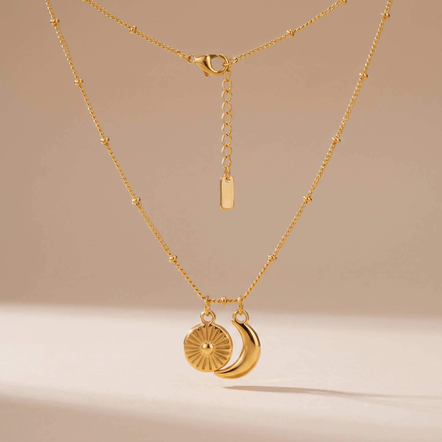 Asea Sun & Moon Charm Necklace — front view