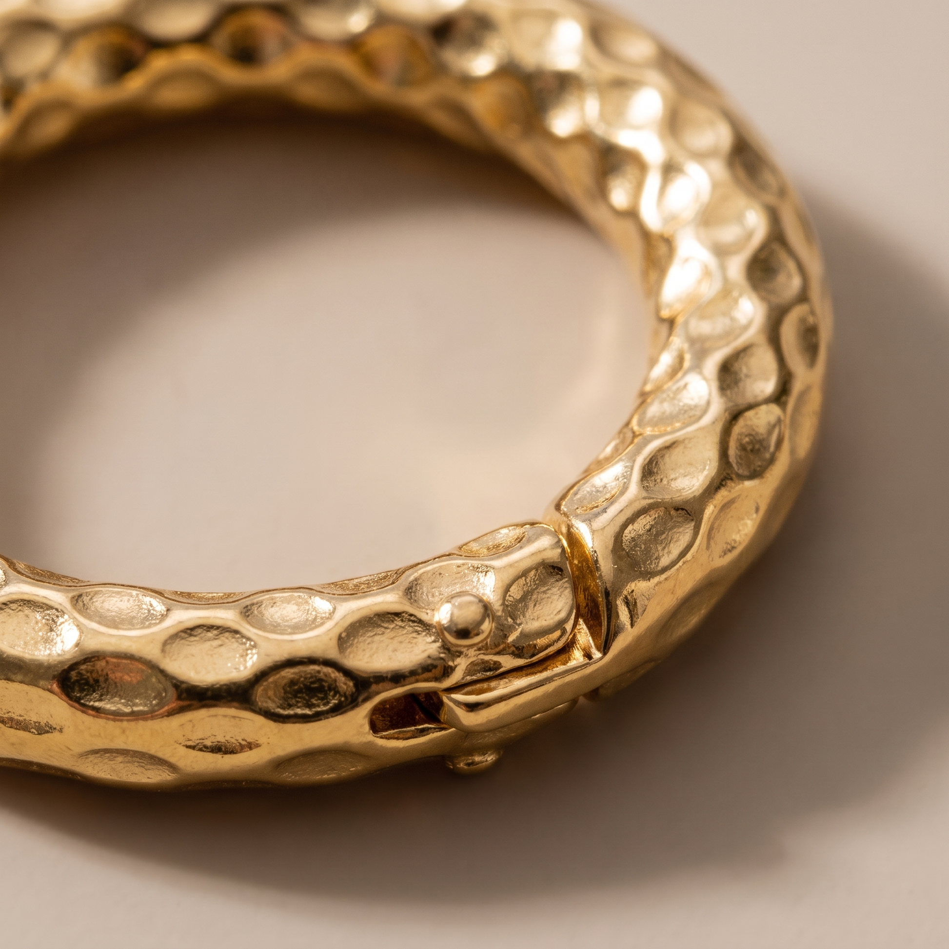 Asea Hammered Gold Hoops — close-up detail