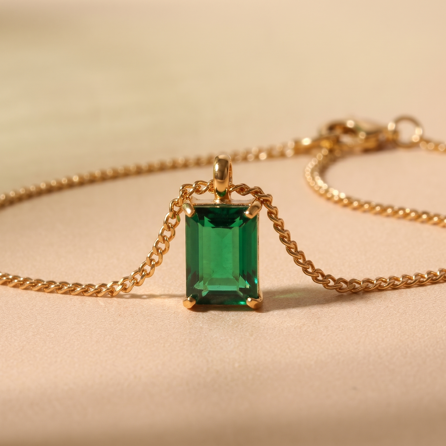 Asea Emerald Pendant Necklace — close-up detail