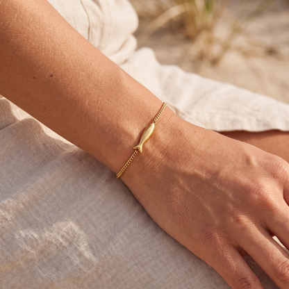 Asea Golden Fish Charm Bracelet — worn by model