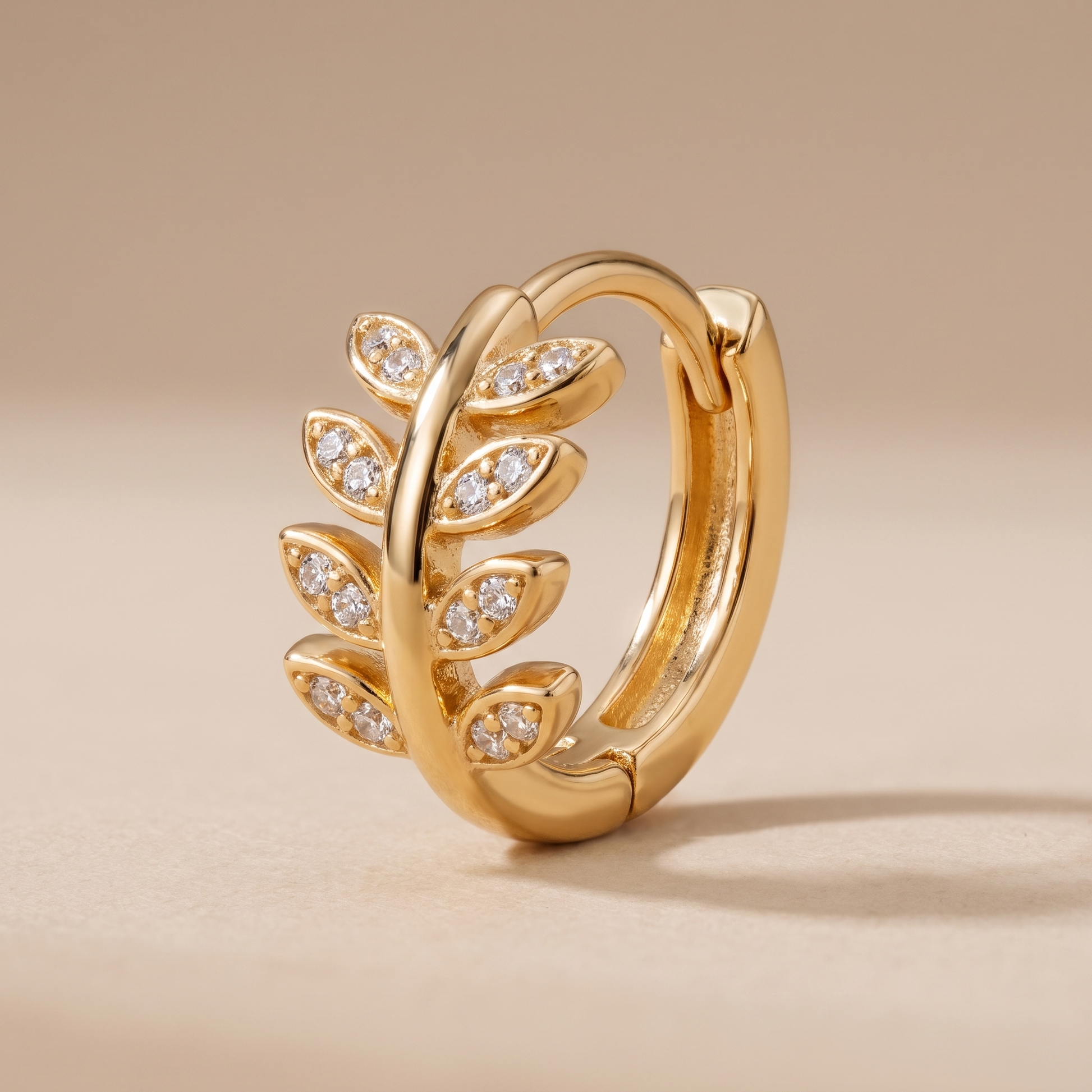 Asea Laurel Huggie Hoops — close-up detail