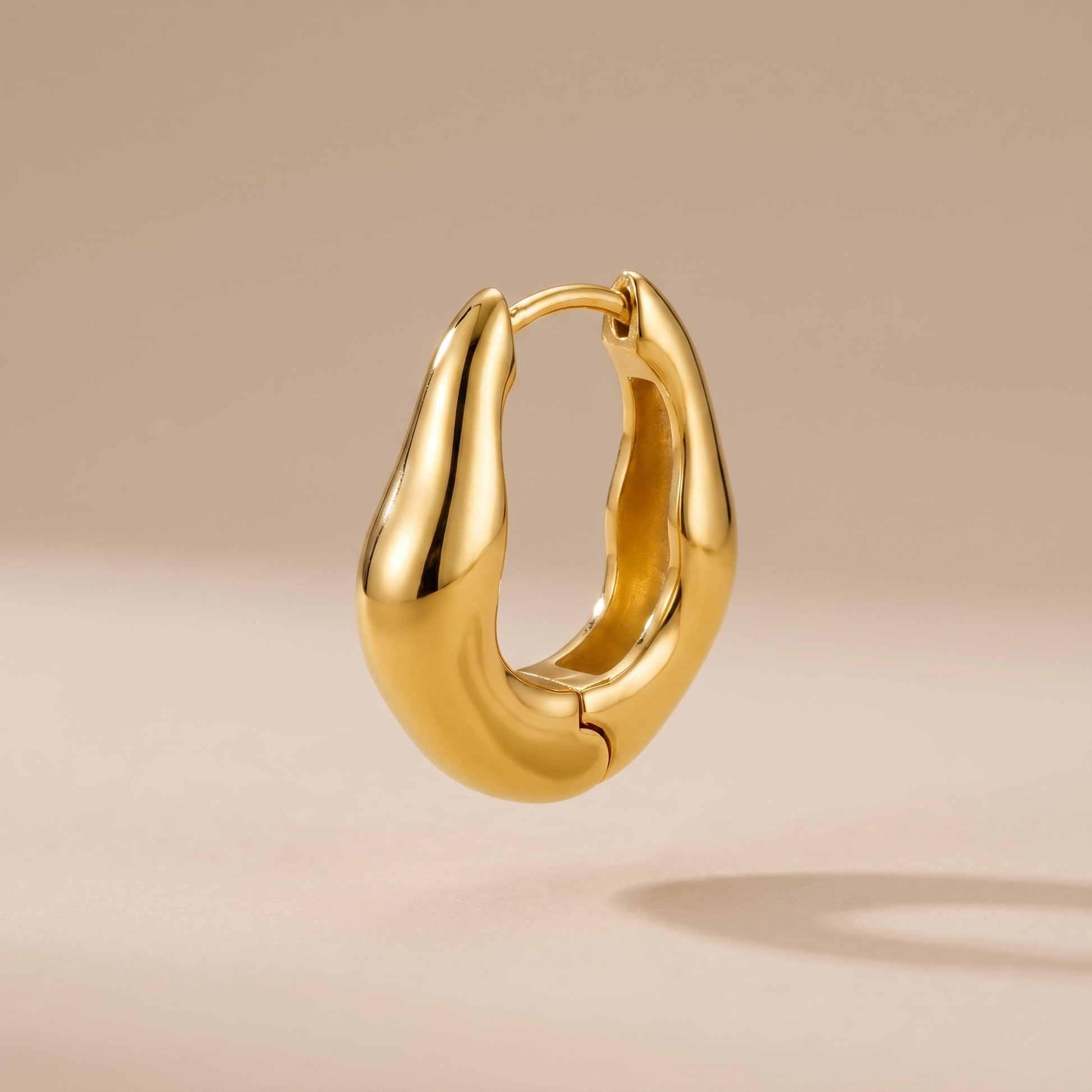 Asea Organic Sculptural Hoops — front view