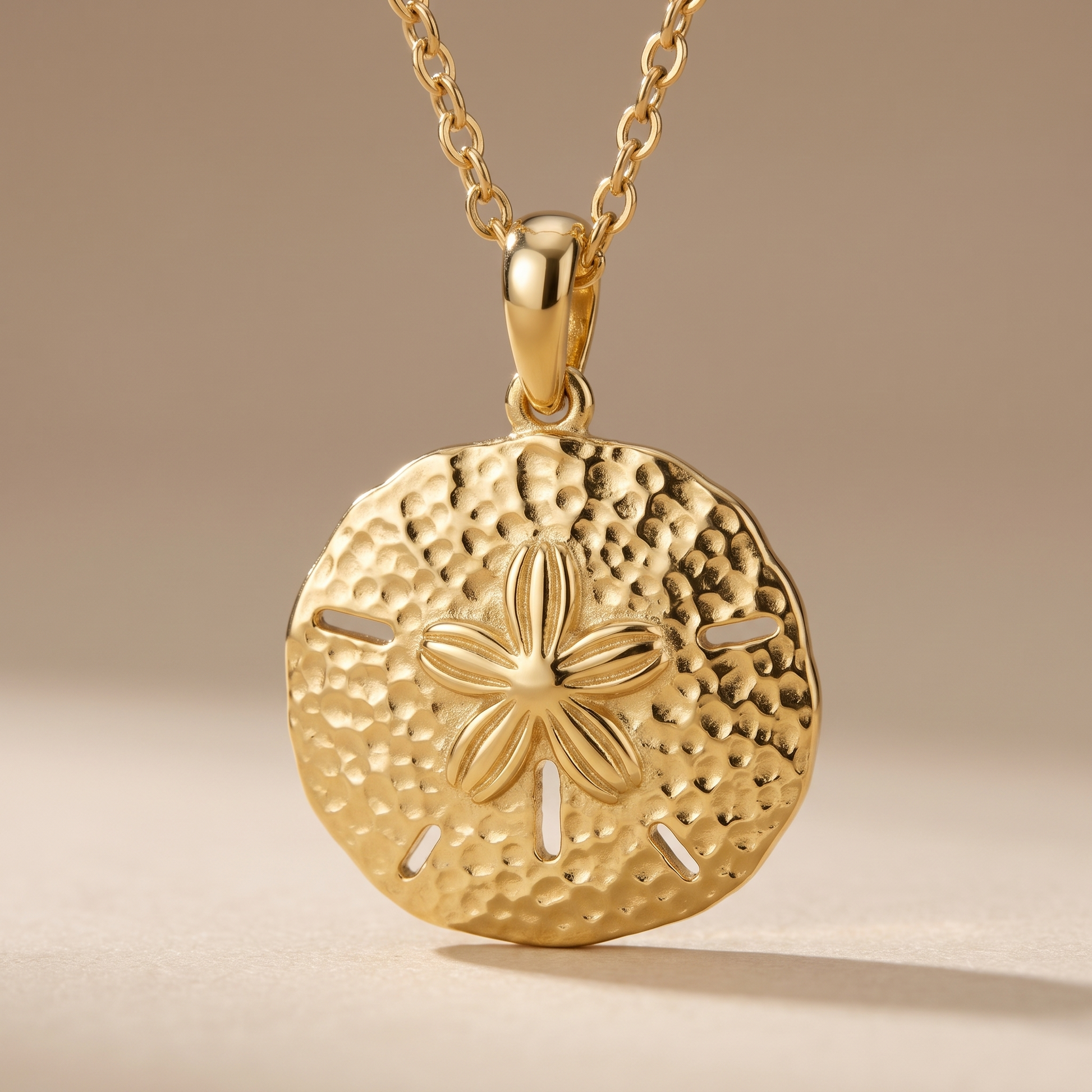 Asea Sand Dollar Pendant Necklace — close-up detail
