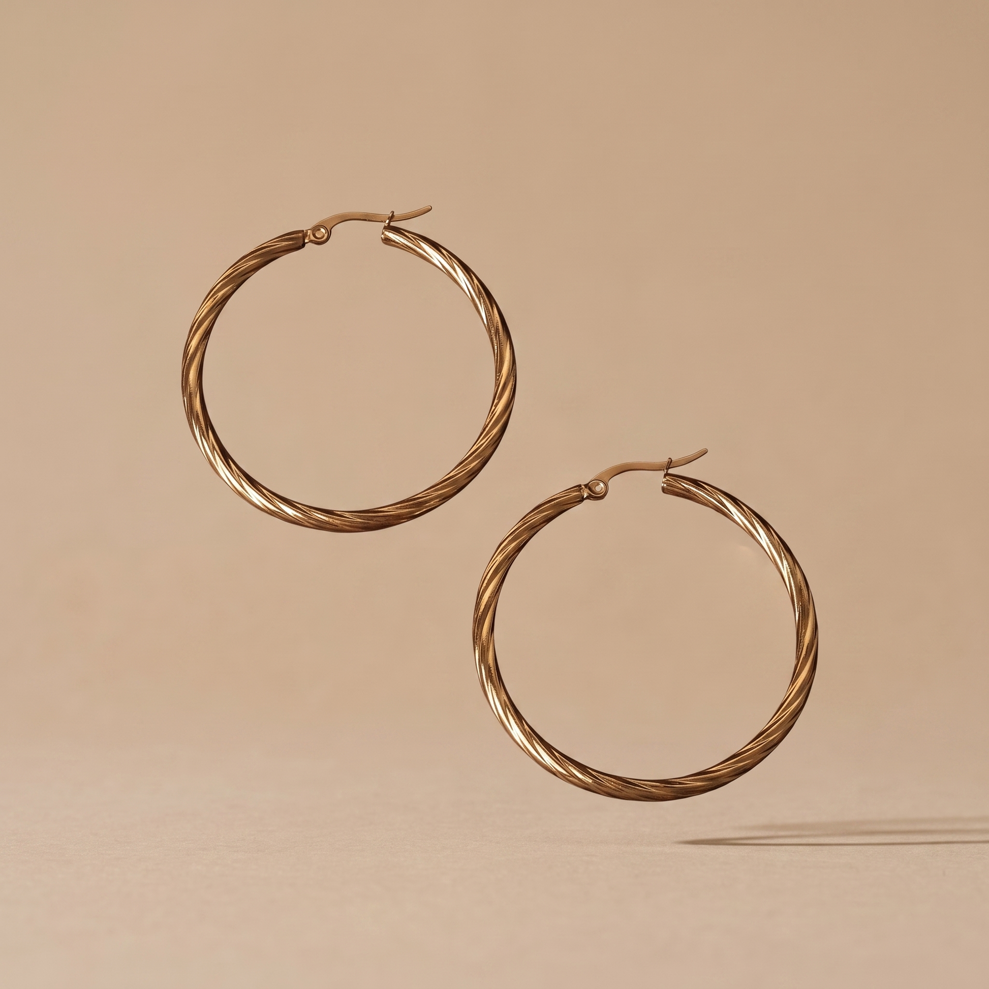 Asea Twisted Statement Hoops — front view