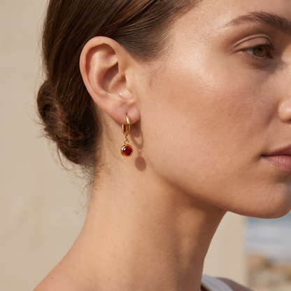 Asea Birthstone Huggie Hoops — worn by model