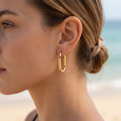 Asea Gold Oval Hoops — worn by model